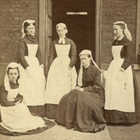 Miss Vizard and nurses, 1871